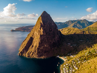 Saint Lucia tropical beach, St Lucia Caribbean huge pitons and jungle drone aerial vie of the...