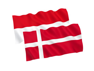 National fabric flags of Indonesia and Denmark isolated on white background. 3d rendering illustration. 1 to 2 proportion.