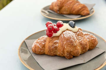 Creamy croissant with berries