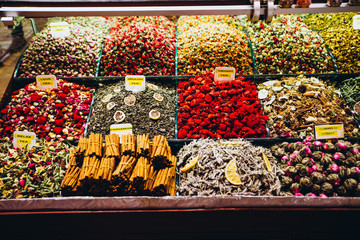A variety of culinary seasonings in the eastern market. Bright and colorful tea shelves from the Grand Bazaar