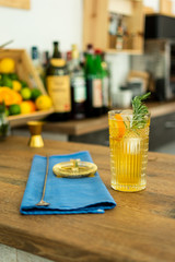 Utensils and fruit in pub or restaurant for preparing a gin tonic cocktail