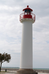Fototapeta na wymiar Lighthouse in Saint Martin de Ré in Ile de Ré in southwestern France