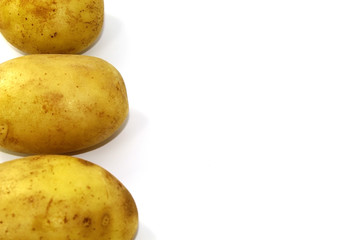 On the side of the photo is potatoes young and fresh