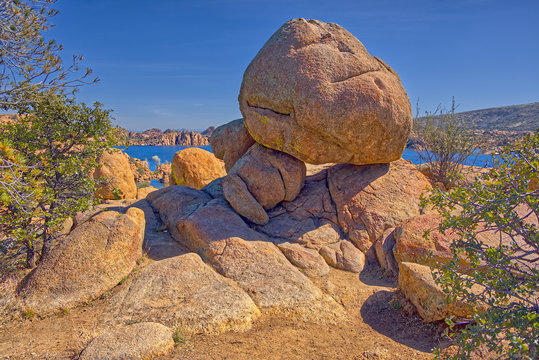 Large boulder balancing on smaller rocks, Watson Lake, Prescott, Arizona, United States