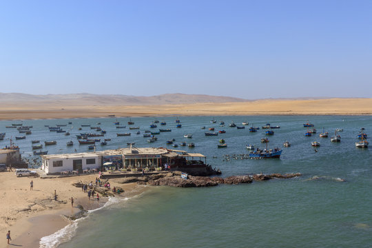 panoramic view over a harbor on paracas peninsula, peru