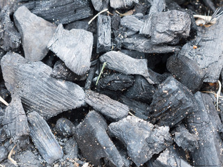 close up of black charcoal for fire on beach unlit