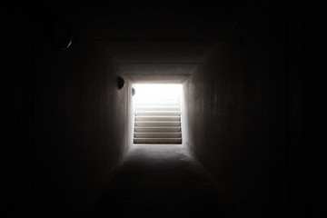 light at the end of the tunnel with a stairs