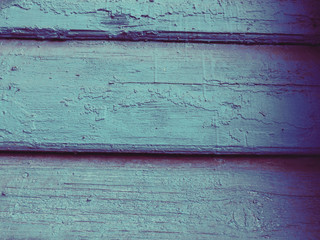 Naklejka premium wooden wall consisting of three boards covered with turquoise paint