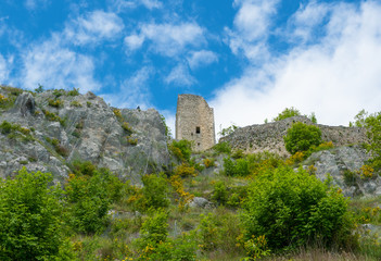Fototapeta na wymiar Cicolano (Italy) - The green mountain area of Salto Lake, Lazio region province of Rieti, with the ruins of medieval castle named Poggio Poponesco