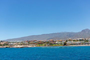 Naklejka na ściany i meble Beautiful coastal view of El Duque beach in Costa Adeje,Tenerife,Canary Islands, Spain