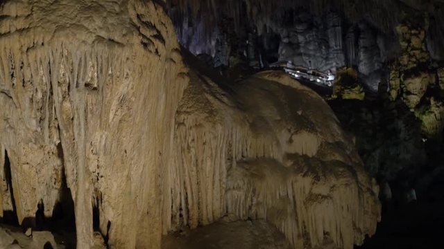 tourist visiting the stalactite cave in nerja spin