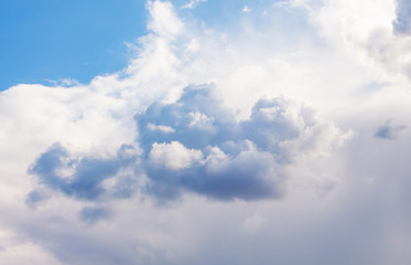 Obraz premium Chimeric clouds on the blue sky in sunny weather_