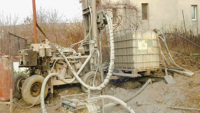 Strange machine makes a well