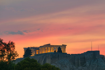 Obraz premium Acropolis, Parthenon view from Panathenaic stadium (Kallimarmaro) at sunset, with colorful sky, Athens, Greece