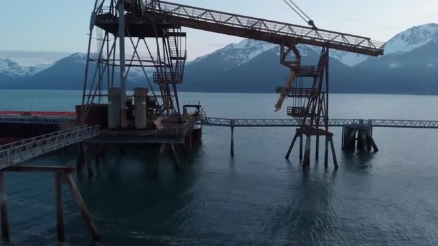 Alaskans subsistence fishing off a barge 