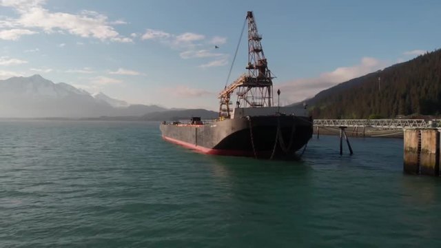 Alaskans subsistence fishing off a barge 