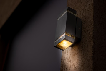 Cubical looking lantern placed on the exterior of a building during night time with copy space – Modern electrical equipment for illumination - 272009798