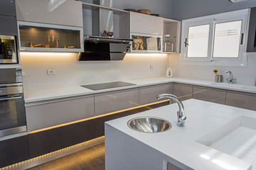 Fototapeta na wymiar Modern kitchen design in a luxury apartment