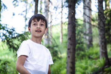 Portrait of the lost boy in the forest, at last that seen people who look for it.