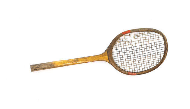 vintage wooden tennis racket on a white background
