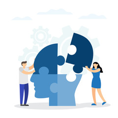 Concept of intellect. People connecting jigsaw pieces of a head together