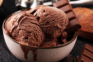 Chocolate coffee ice cream ball in a bowl. ice cream scoop
