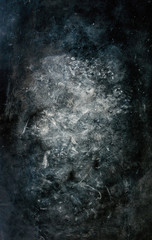 Old dark concrete background with white splatter