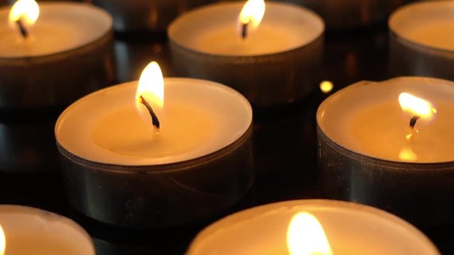 Candles on a black background.