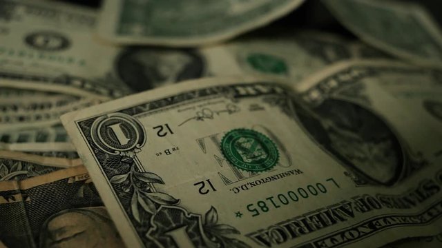 Dollar bills, money background. Dollars money set with count to bills of one hundred dollars. Closeup on the bills for a hundred dollars. Dollars, money close up.