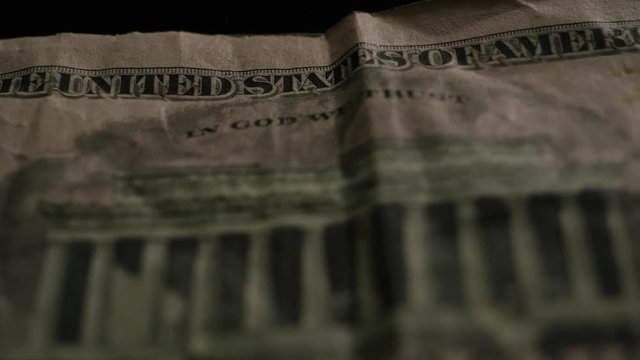 5 US Dollars bill extreme close up, macro