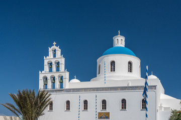 Traditional Greek Orthodox church in village of Oia on Santorini