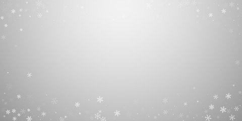 Sparse snowfall Christmas background. Subtle flying snow flakes and stars on light grey background. 