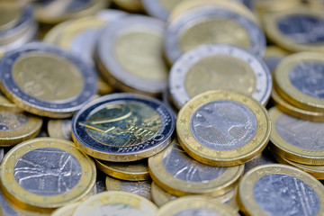 frame filling one and two Euro coins macro color picture as background