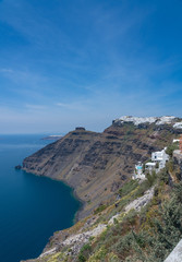 Fototapeta na wymiar Pathway on cliff to Imerovigli and Firostefani above village of Fira on Santorini