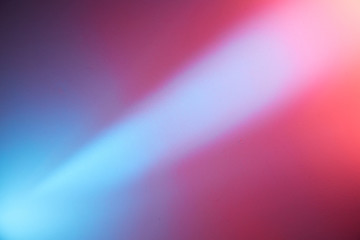 Light blue ray of light separates blue red and light red background
