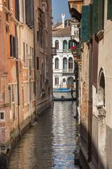 Fototapeta na wymiar Venice canal ,narrow navigation routes in Venice, march, 2019