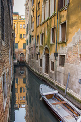 Fototapeta na wymiar Venice canal ,narrow navigation routes in Venice, march, 2019