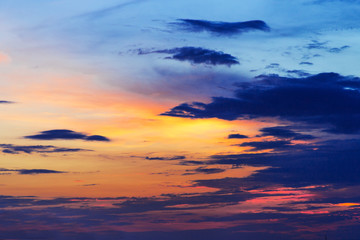 Naklejka na ściany i meble colorful dramatic sky with clouds at sunset.