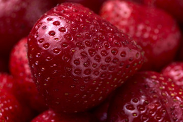 Close-up fresh peeled strawberries.