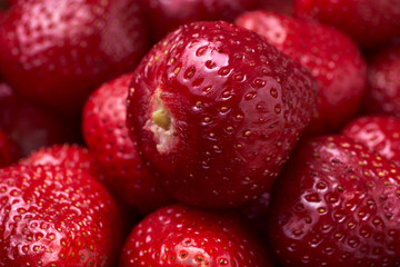 Close-up fresh peeled strawberries.