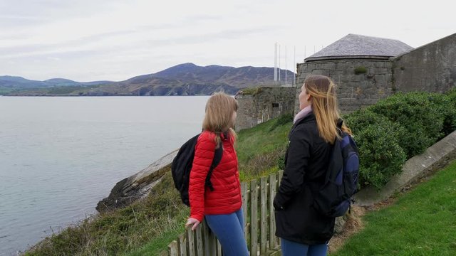Two young women visit Fort Dunree in Ireland - travel photography