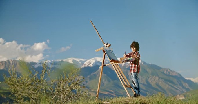 Young boy creating an artpiece, inspired by beauty of lake in mountains, making his dream of becoming artist come true - childhood memories, inspiration 4k