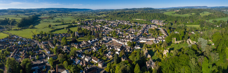 Fototapeta na wymiar Panoramic view of the picturesque town of Usk in South Wales, with the castle clearly dominating the town on the right hand side