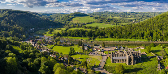 Aerial panoramic view of the ruins of Tintern Abbey, a Cistercian monastry located by the river Wye...
