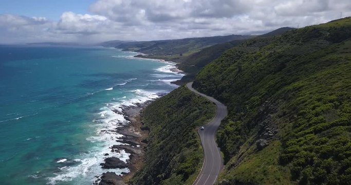 Beautiful ocean drive on coastal road (aerial view)