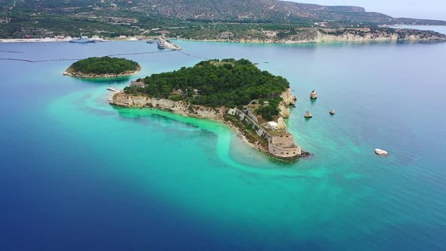 Aerial drone video of famous Venetian fortified islet of Souda featuring small chapel of Agios Nikolaos, Chania, Crete island, Greece