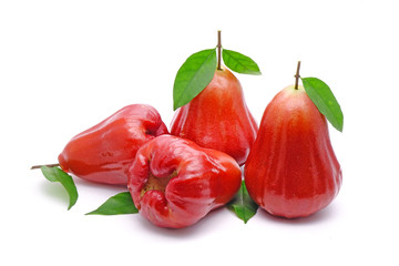 Rose apple or Bell fruit with green leaves isolated on white background.