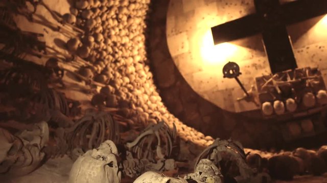 LAMPA, PERU- 8 DECEMBER 2017: Free exposition of human bones in the crypt  of the church of the Inmaculada Concepci&oacute;n de Mar&iacute;a during the festivities in Lampa, Peru. 4k