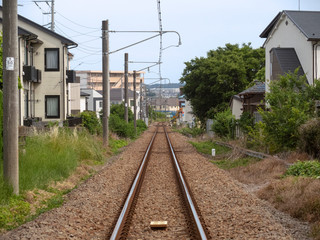 Fototapeta na wymiar 住宅街を通る鉄道