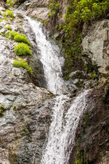 Fototapeta na wymiar waterfall in mountains
